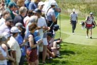 Lee Hodges with his caddie at the 3M Open (Image via Getty)